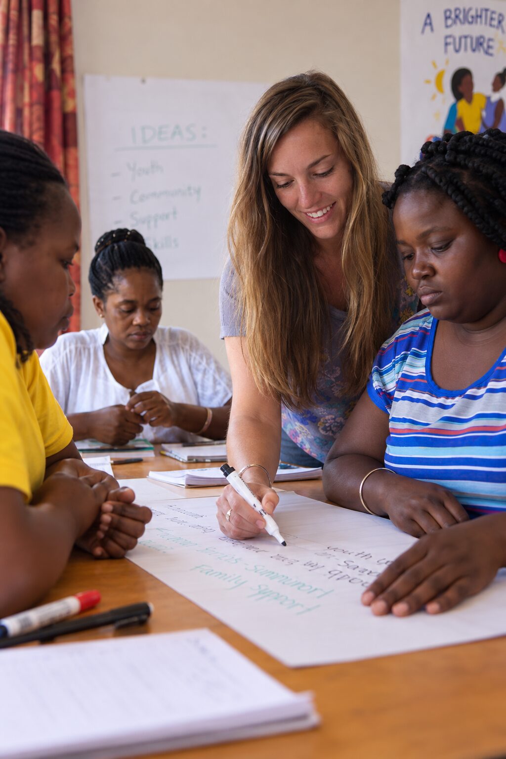 VAC Social Work intern working alongside local staff during a community program in Cape Town.